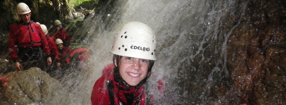 Gorge scrambing involves walking under water falls.